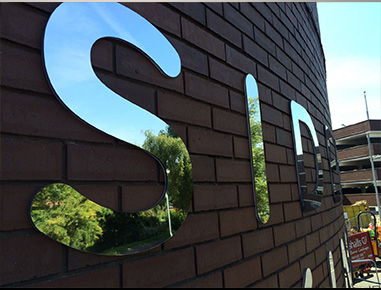 Mirrored letters on stud locators